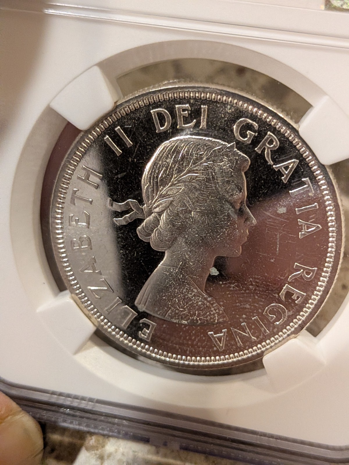 1964 CANADA SILVER $1 DOLLAR..NGC PL-65