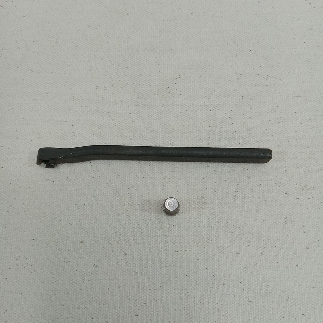 M1 Carbine Gas Piston Nut Wrench with a Piston