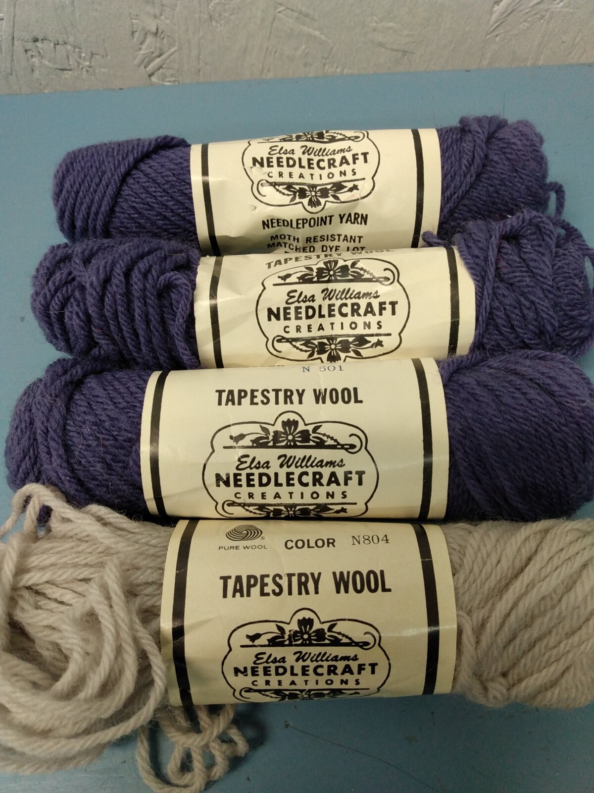 Lot of 4 needlecraft purple toned yarn (LL)