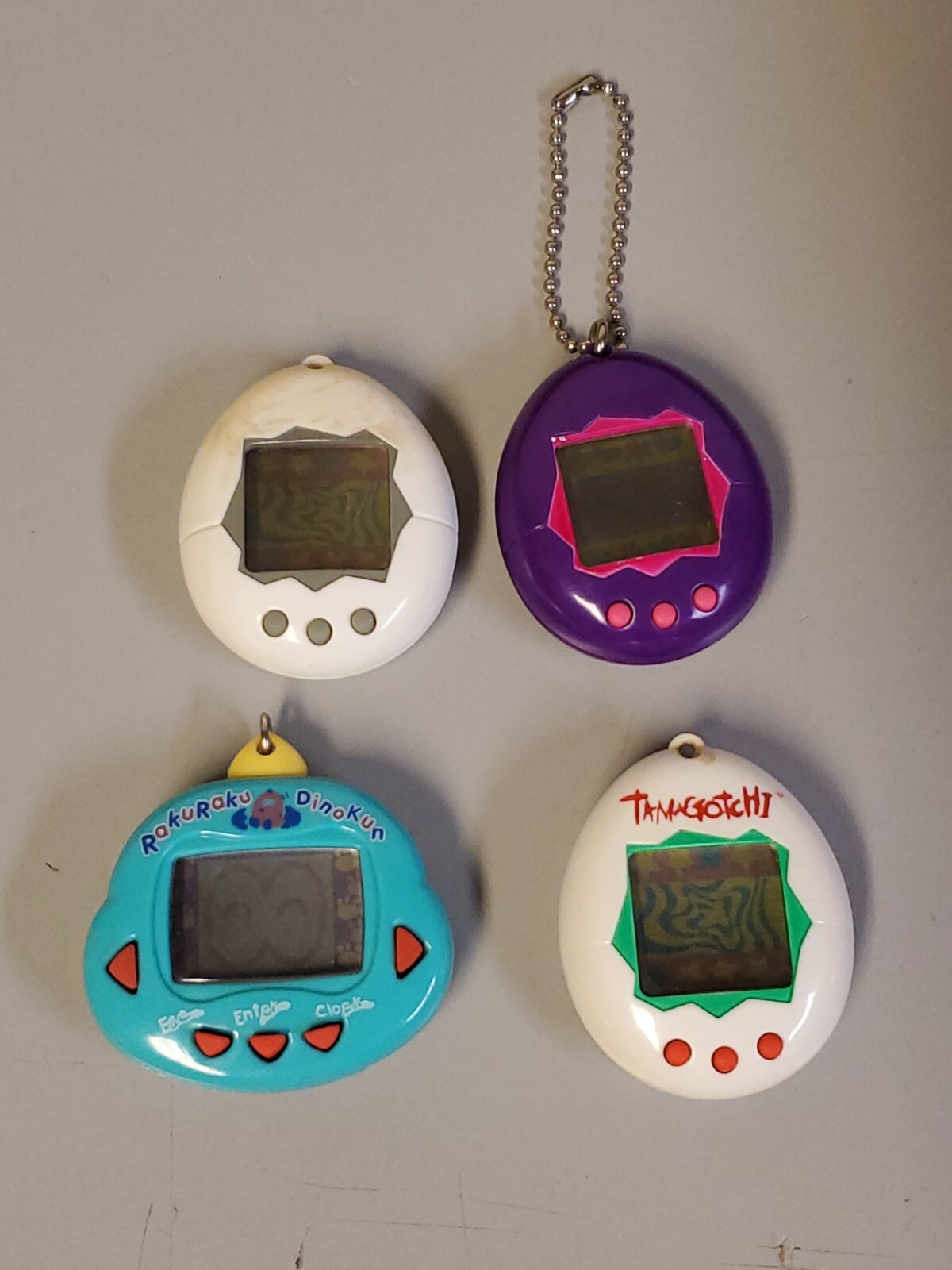 Rakuraku Dinokun And 3 First Generation Tamagotchi Digital Pets Lot 4pctot 1996