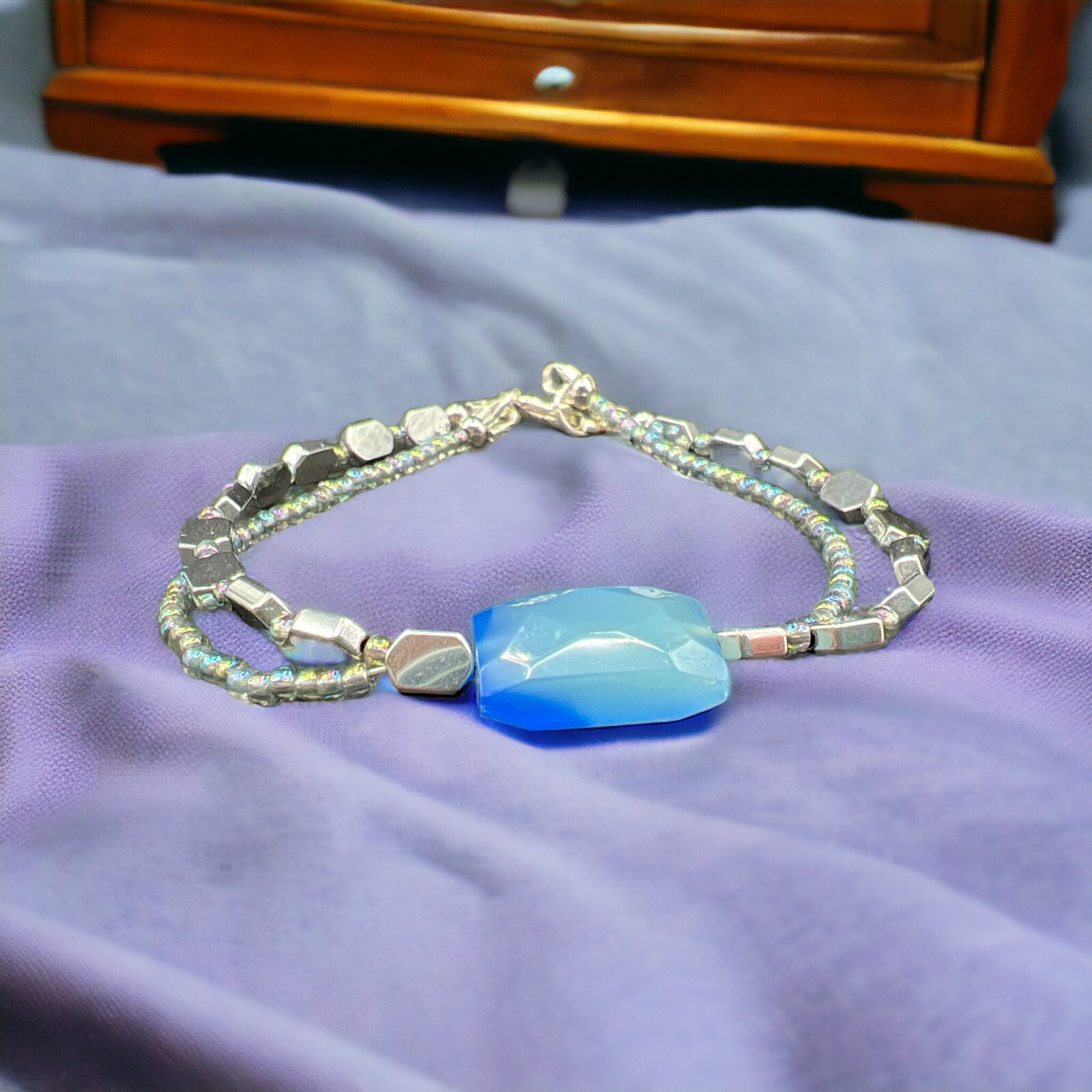 Handmade faceted blue focal bead bracelet w/hematite and glass seed bead accents