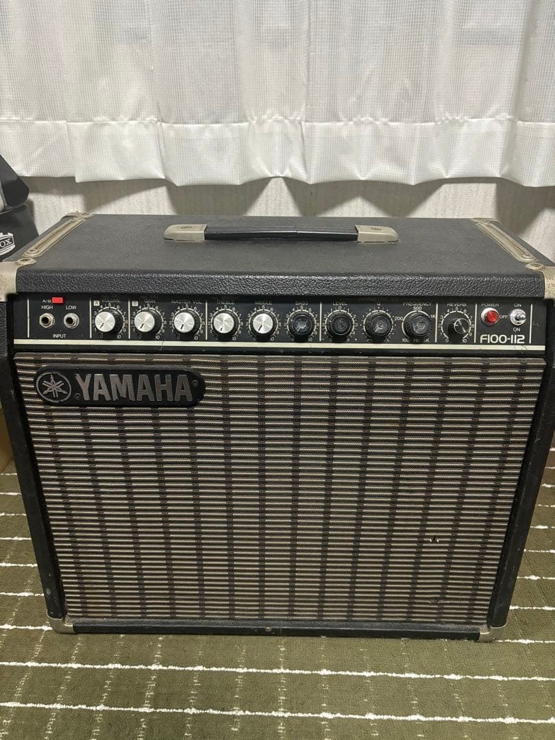 YAMAHA F100-112