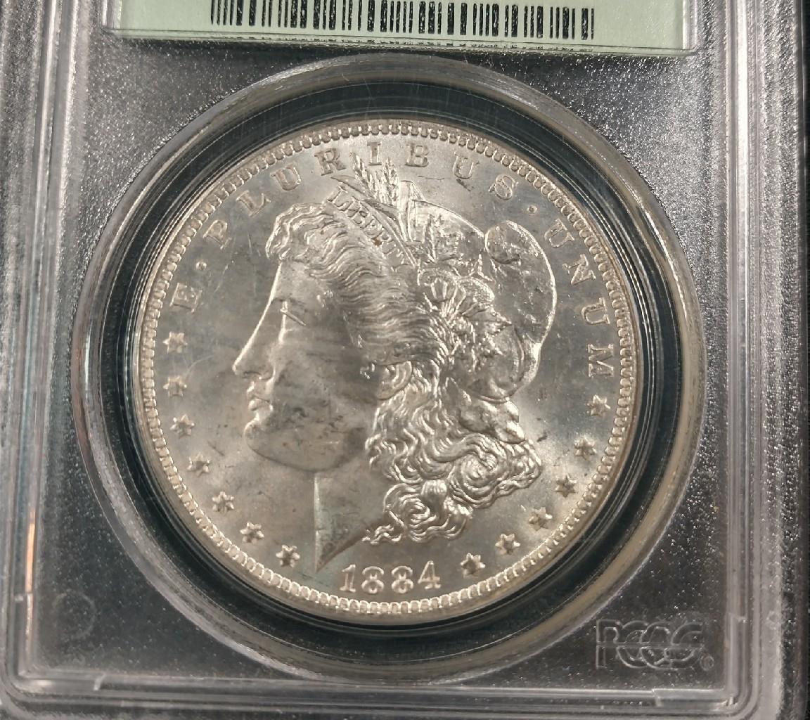 1884-O MORGAN SILVER DOLLAR - PCGS MS63