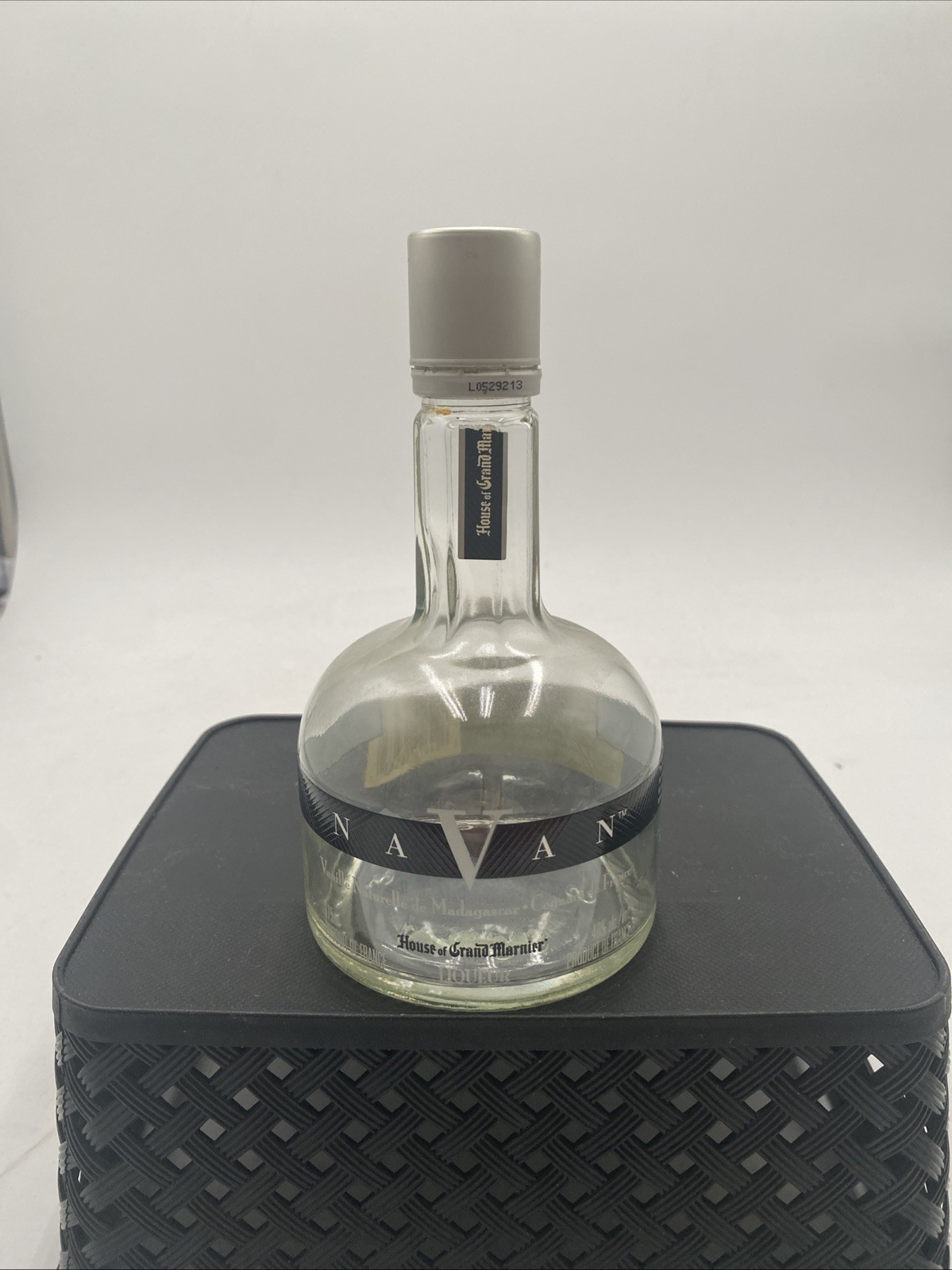 empty bottle of Grand Marnier Navan Natural Vanilla Liqueur