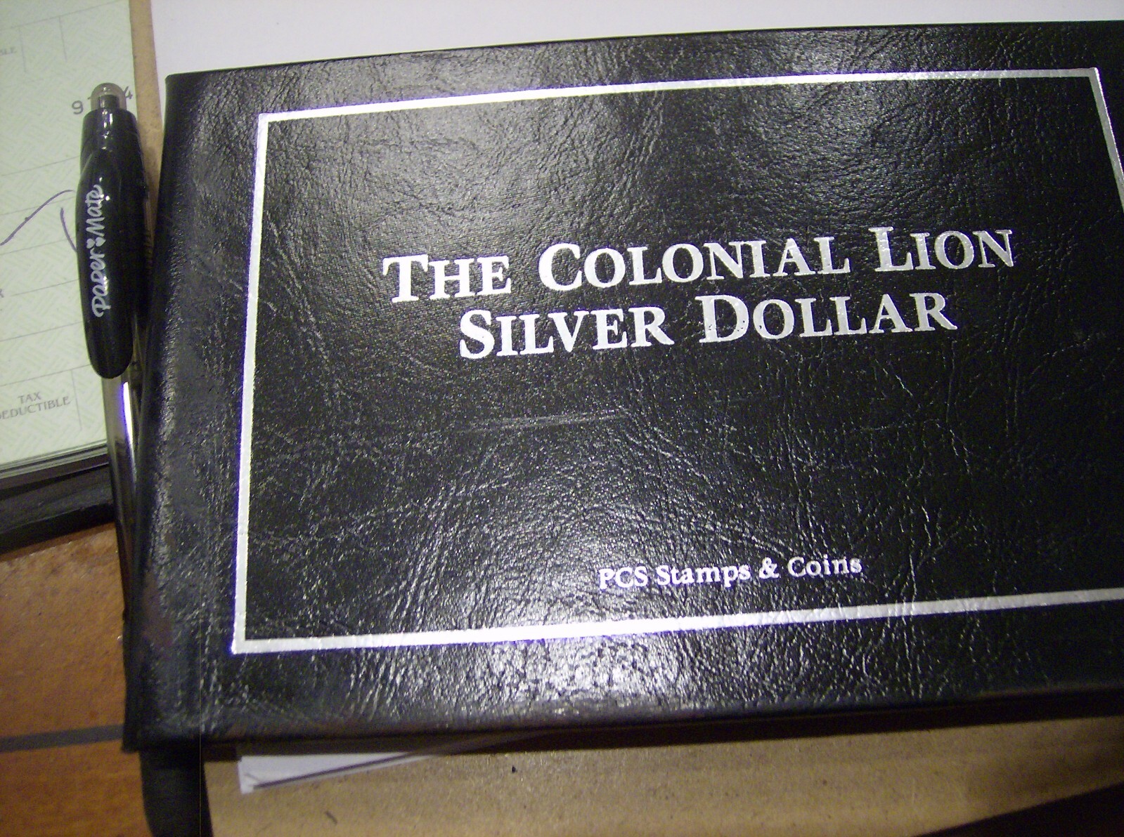 THE COLONIAL LION SILVER DOLLAR NETHERLANDS PCS STAMPS AND COINS CASE FOLDER