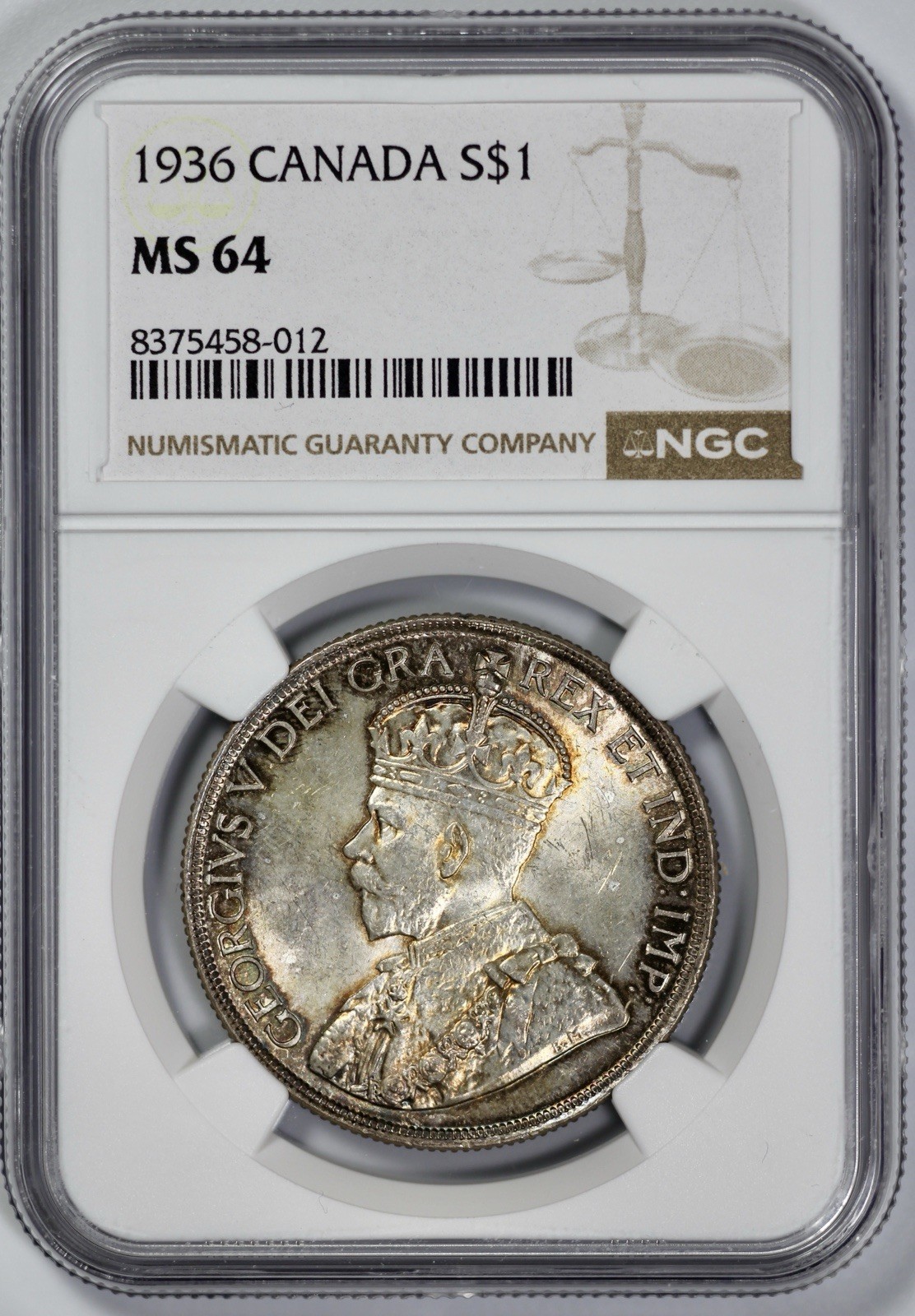 1936 Canada $1 Silver Dollar NGC MS 64 Amber Toning