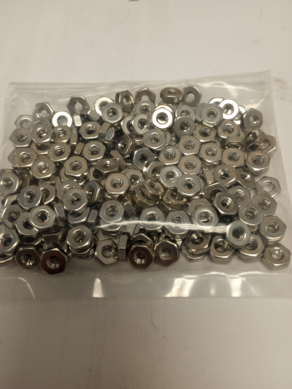 12-24 STAINLESS STEEL HEX MACHINE SCREW NUTS      50PCS