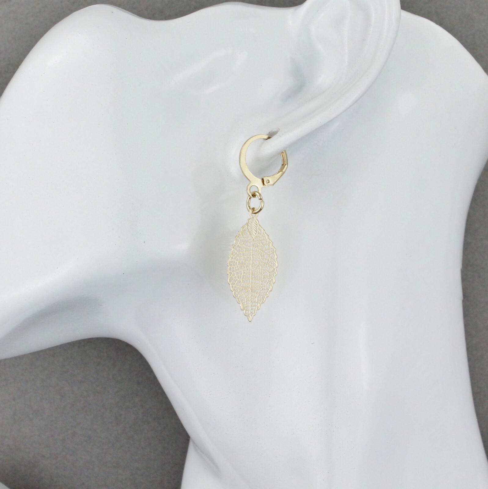 gold leaf earrings small filigree leaves dangle 1.75" long leverback lightweight