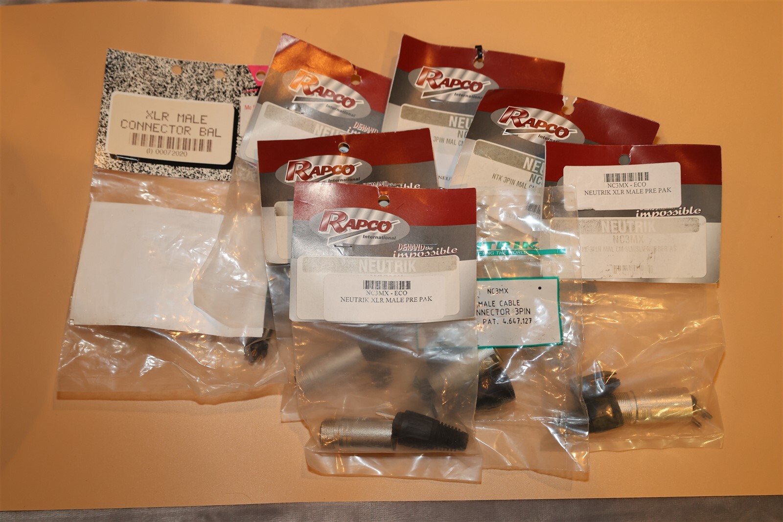 8 assorted premium brand 3-pin male XLR connectors in bags 7 Neutrik & 1 Peavey