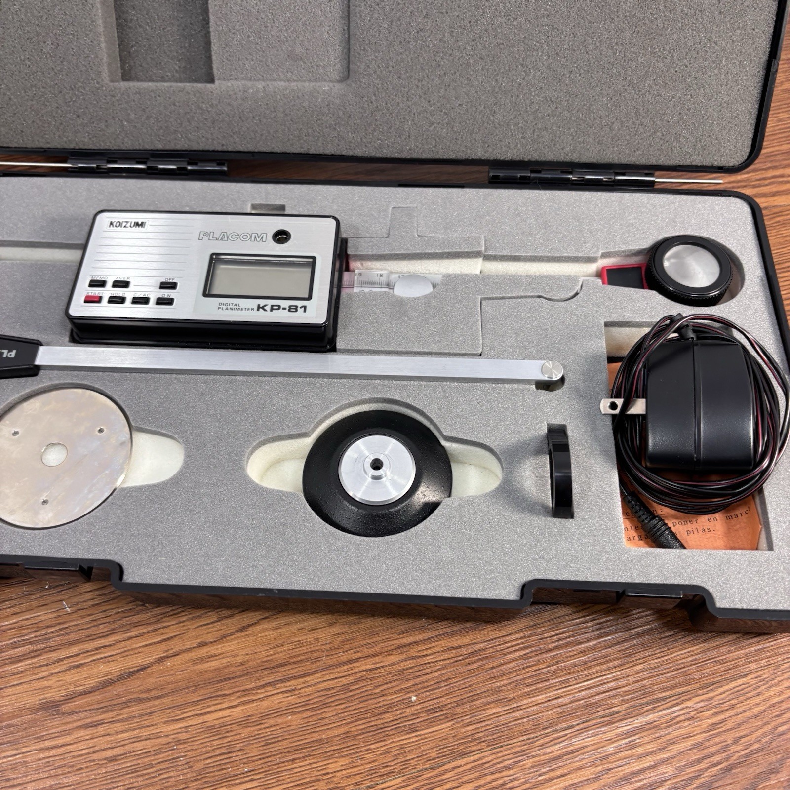 Placom Digital Planimeter Model KP-81, Hard Case, Power Adapter, & Manual