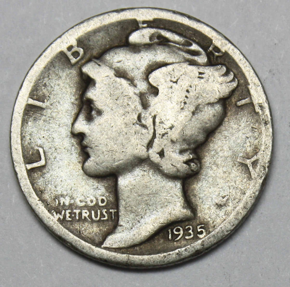 1935-d Mercury Head Dime. Error Double Date.  (Inv. B)