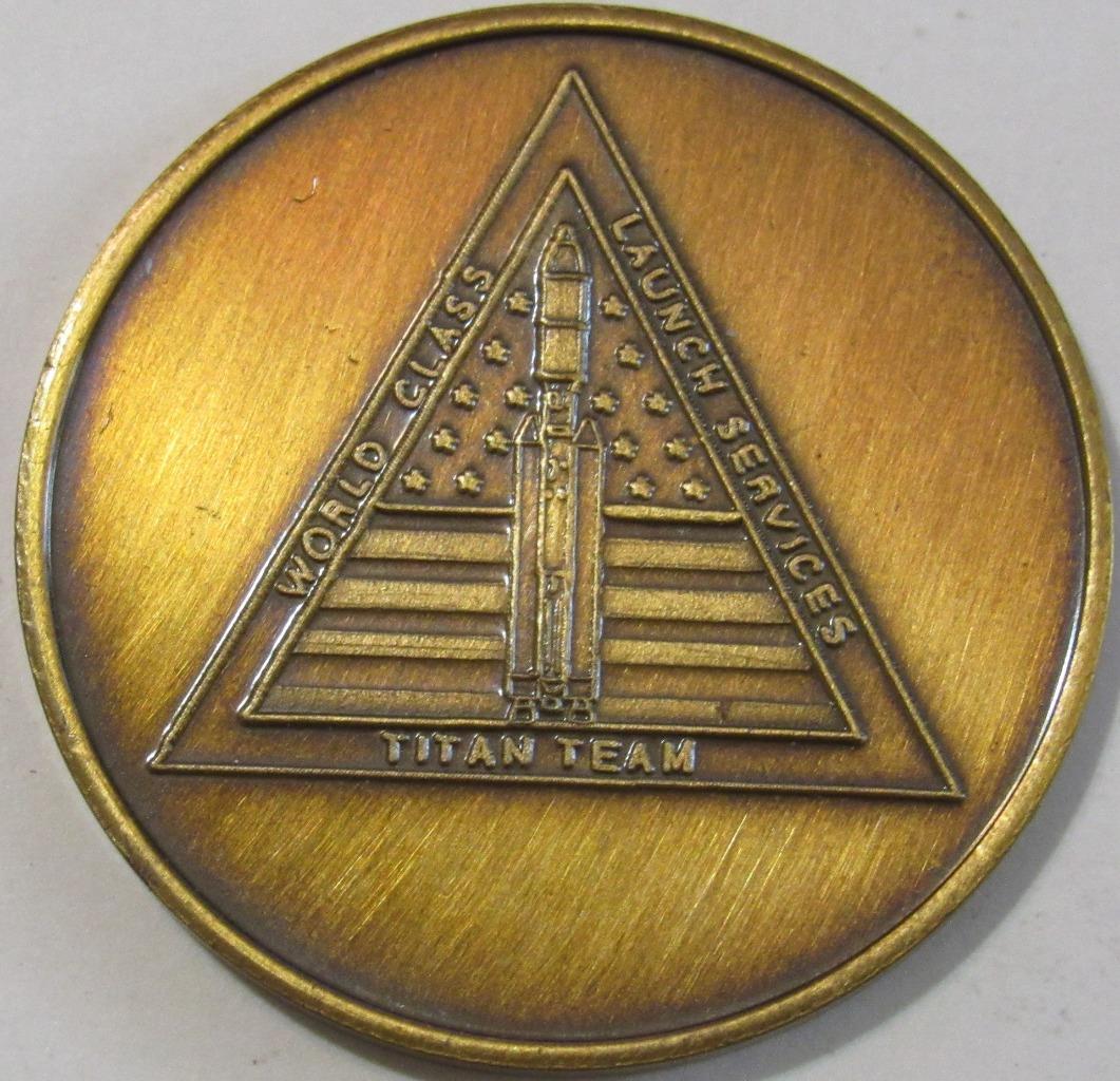 TITAN TEAM WORLD CLASS LAUNCH SERVICES ANTIQUE BRONZE COIN 1.5" 45TH SPACEWING
