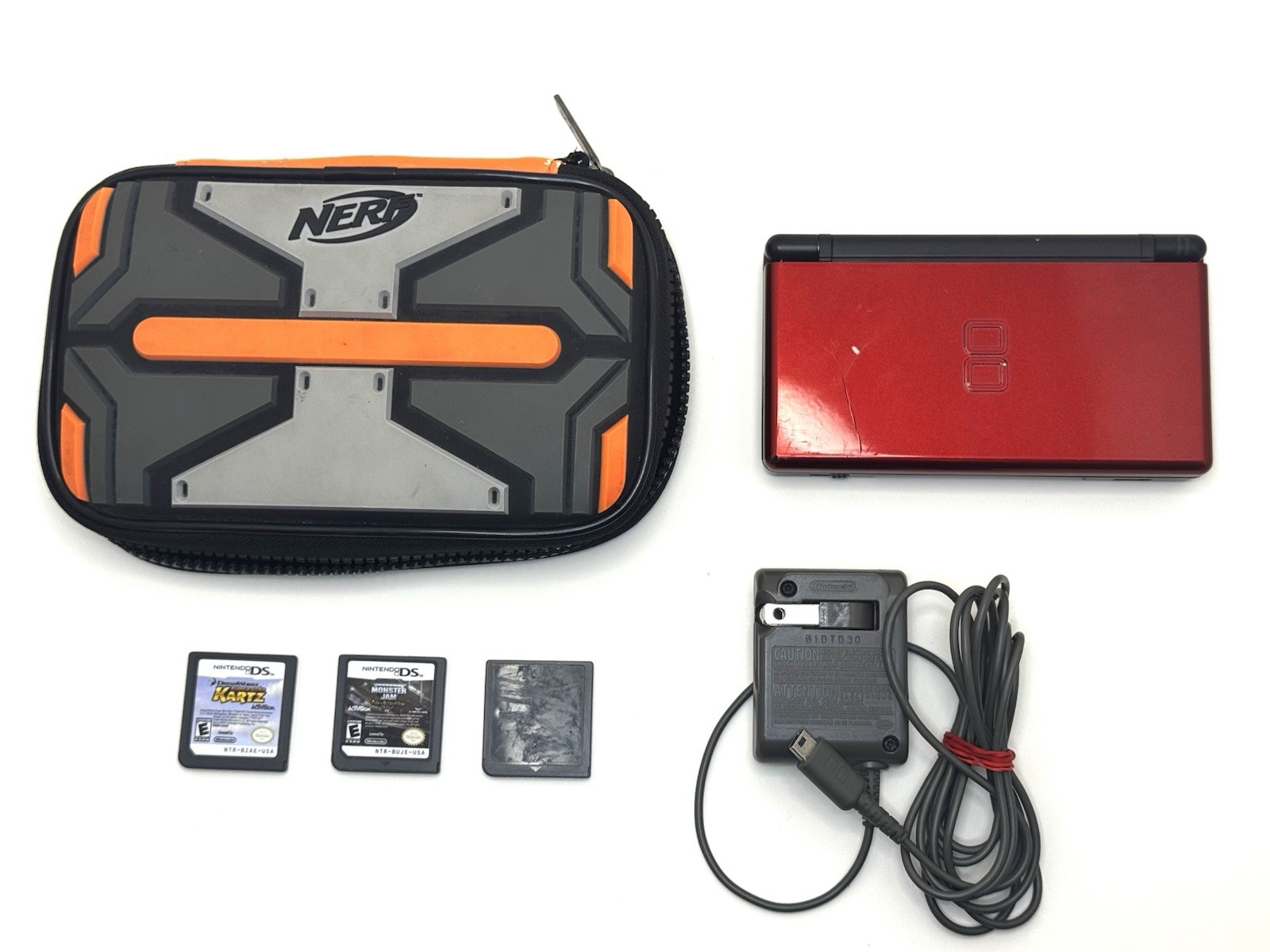 Nintendo DS Lite Crimson Handheld System Bundle Red Charger 3 Games Nerf Case