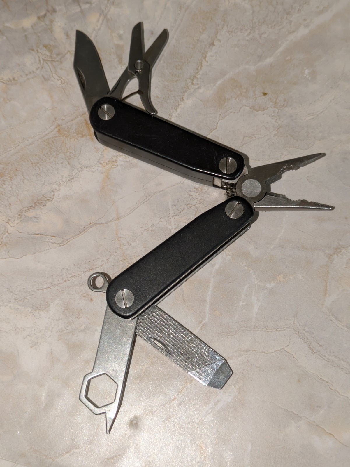 Black STRIKE KING Multi-Tool with Pliers File Scissors & More