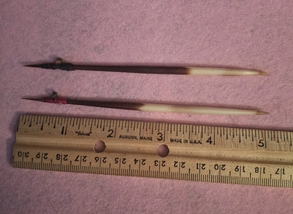 TWO HANDCRAFTED PORCUPINE QUILL FLOATS