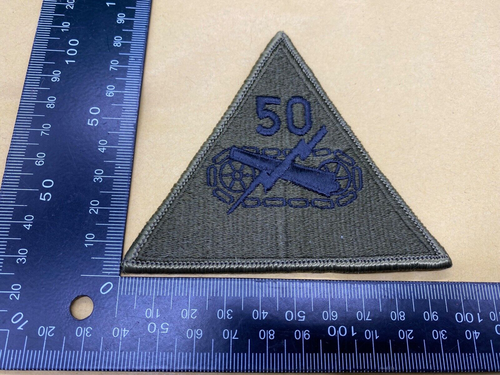 An original US 50th Armoured Division Patch/Badge. Brand New Unissued Condition
