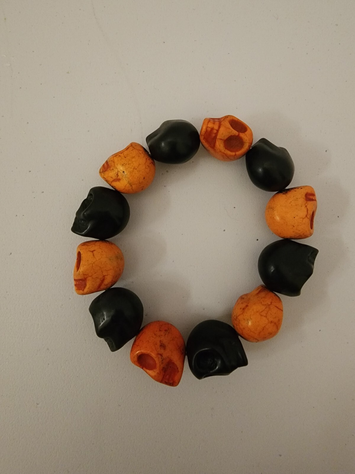 Large Black and Orange Magnesite Skull Bead Bracelet Elastic