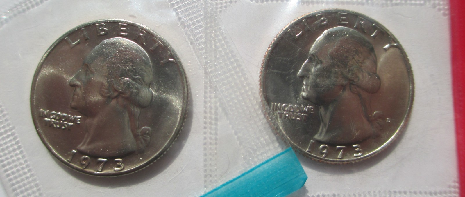 1973 P & D Washington Quarters in mint cellophane uncirculated