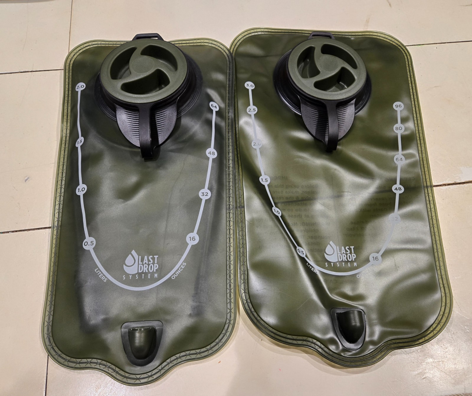 2 Outdoor Products Last Drop Systems 96 Oz  3 Liter and 64 Oz 2 liter bladders