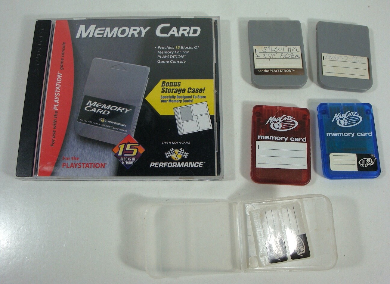 4 Sony Playstation PS1 Memory Cards - 2 MadCatz & 2 Performance