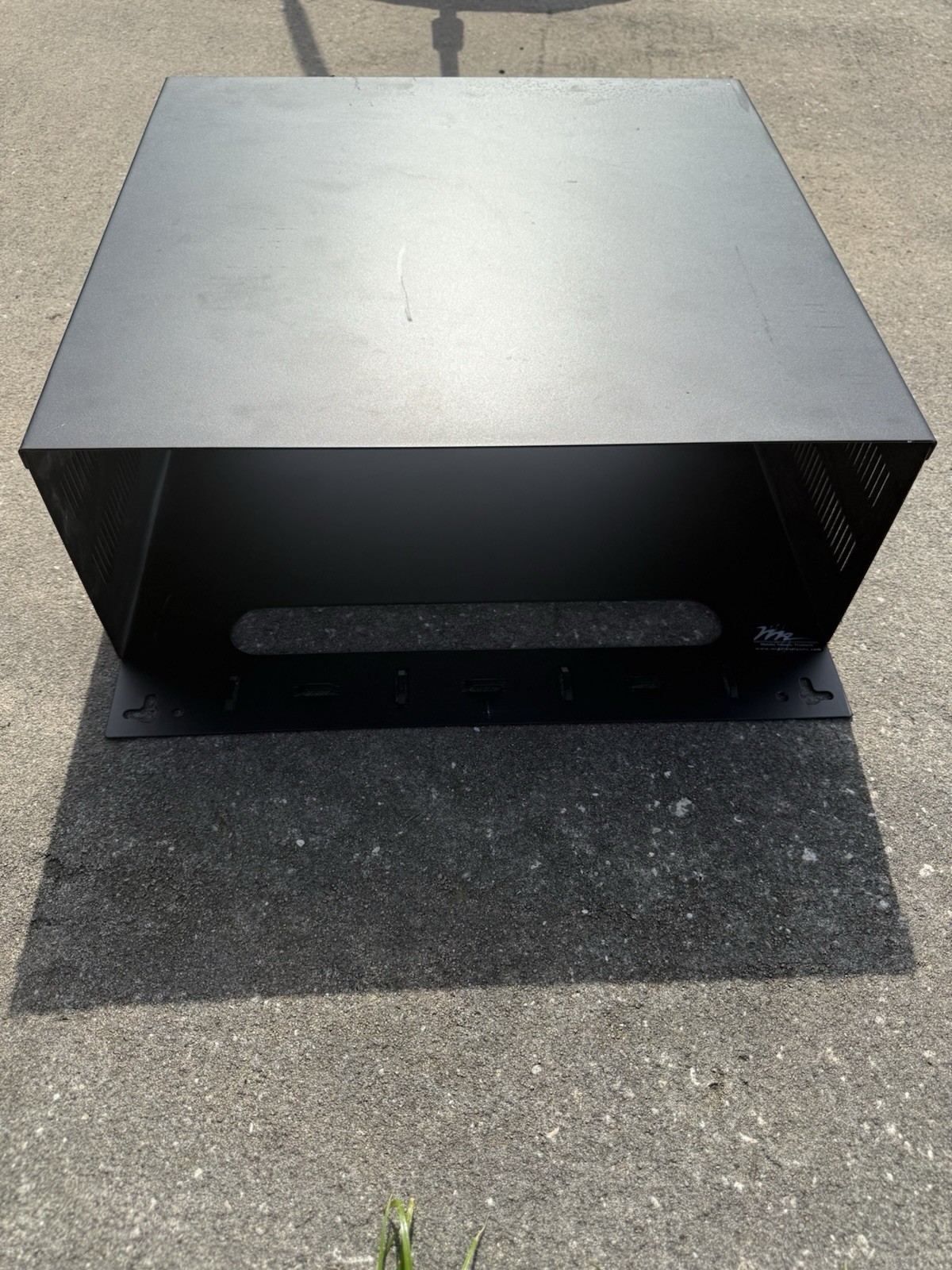 4RU vertical wall mount rack for network equipment and patch panels.