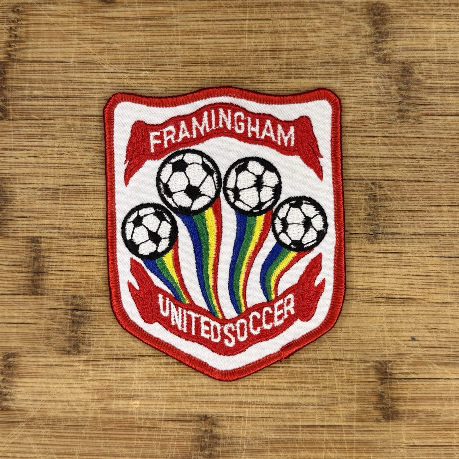 Framingham United Soccer Patch 4x3.25 Shield Embroidered Red Rainbow Sew On