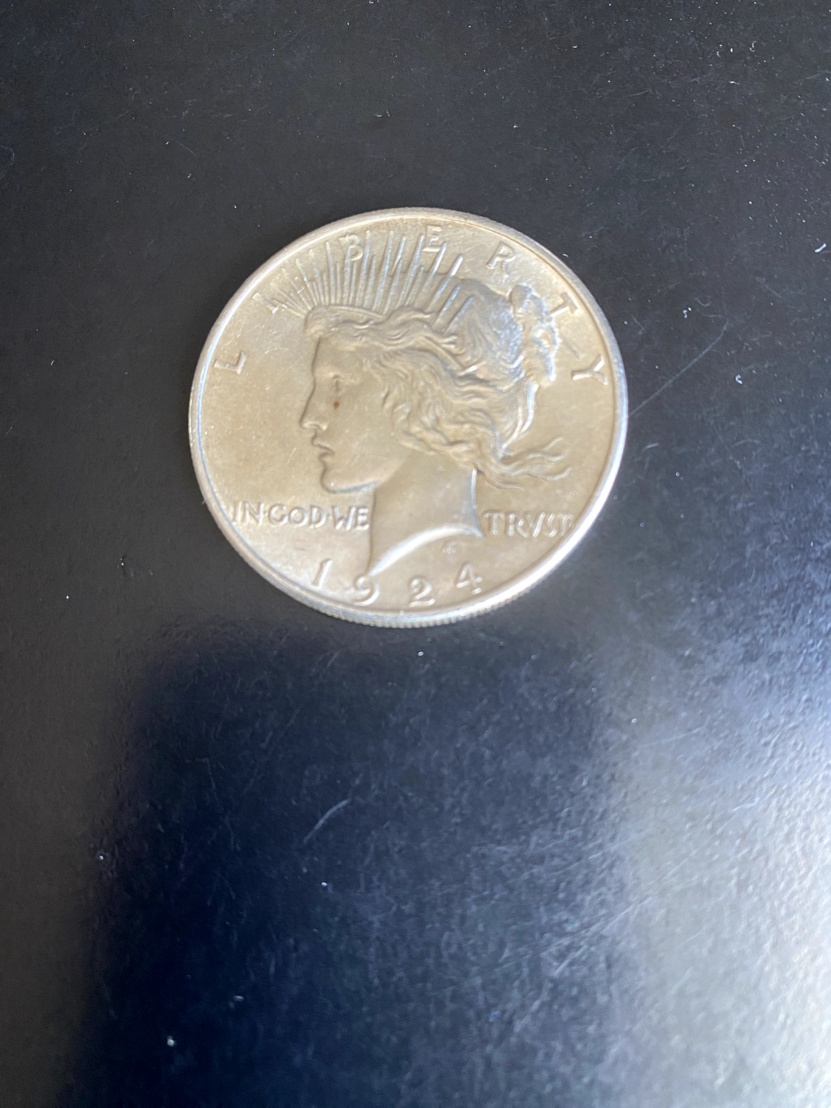 1924 SILVER PEACE DOLLAR, PHILADELPHIA MINT. NICE HIGHER GRADED. #1
