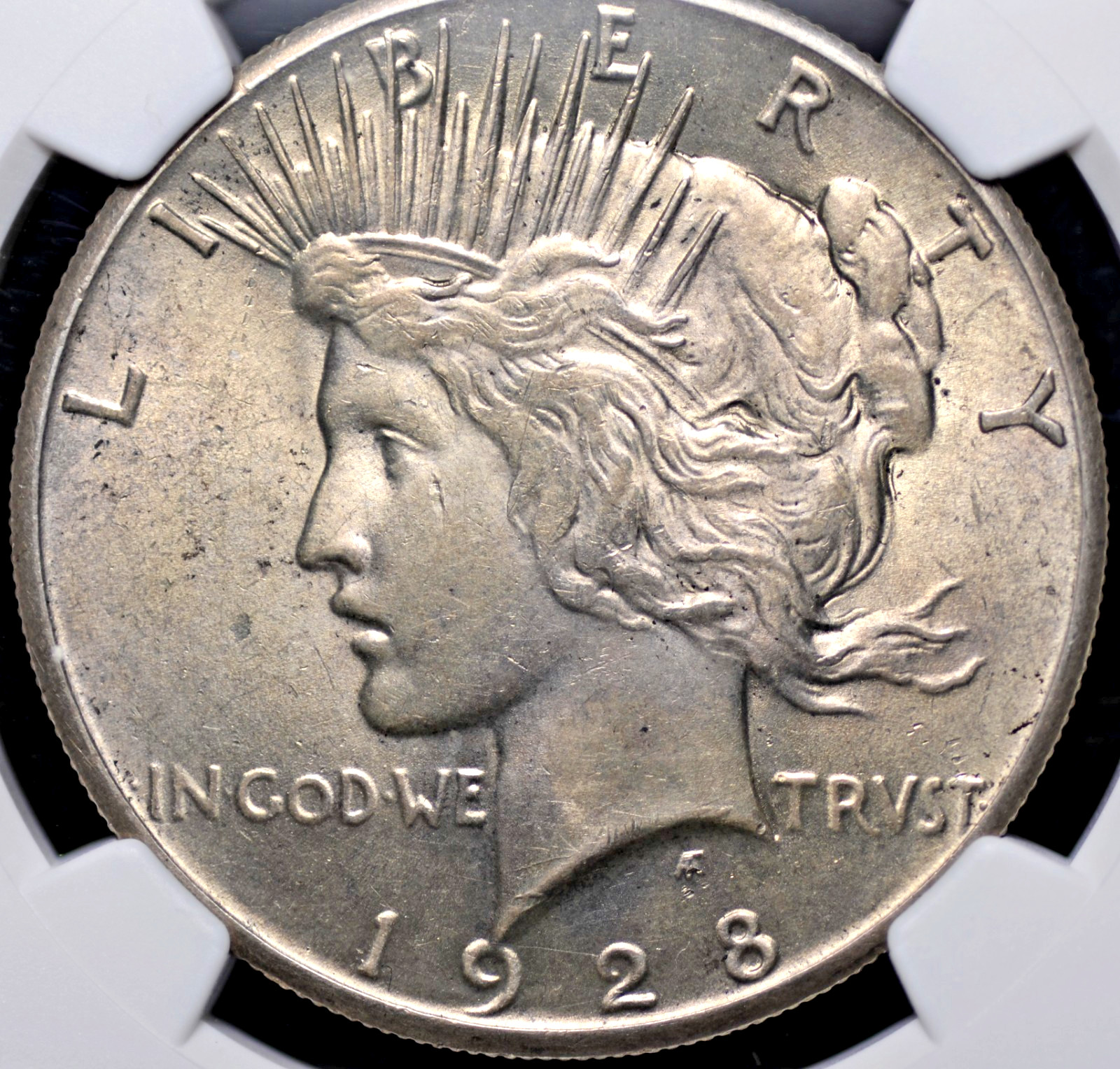 1928 PEACE DOLLAR NGC MS 62 UNCTUOUS LIGHT SILVERY AMBER/ROSE OVER BOTH SMOOTH