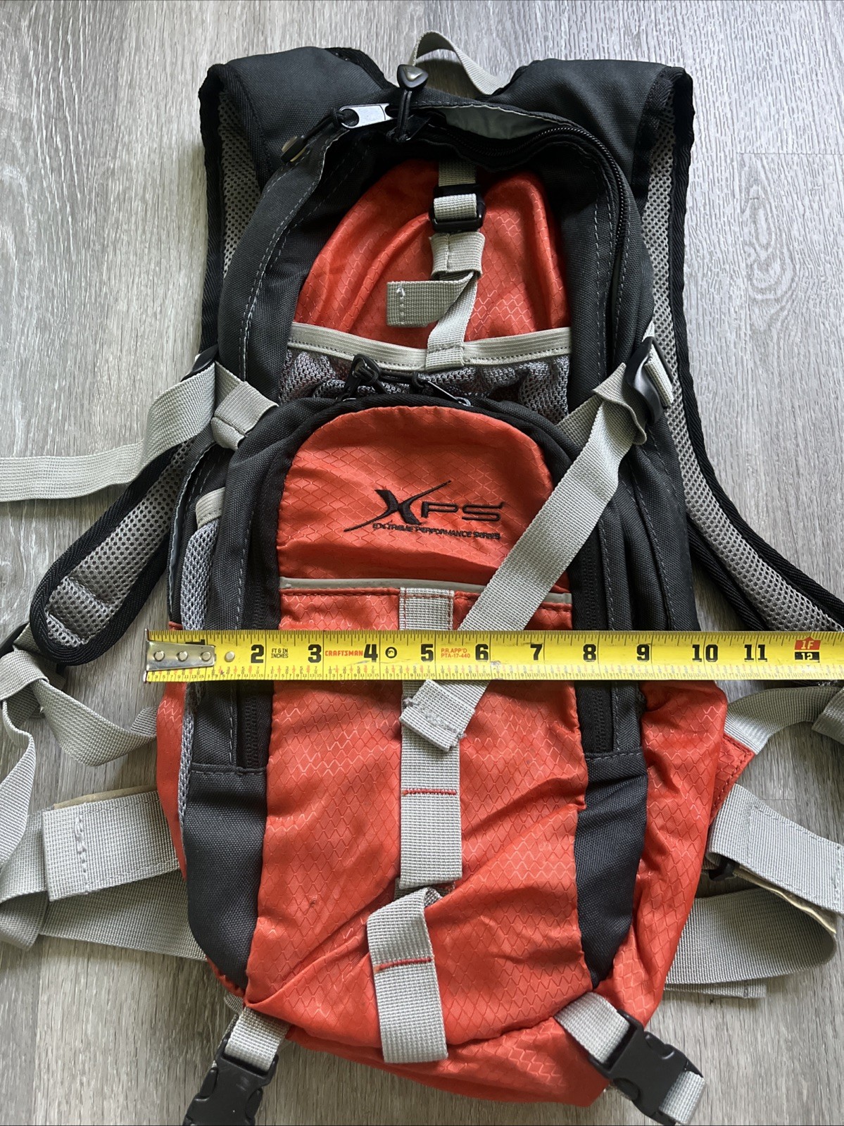 Bass Pro Shops XPS 2 L 68 Oz Rip-Stop Hydration Backpack + Bladder ORANGE BLACK