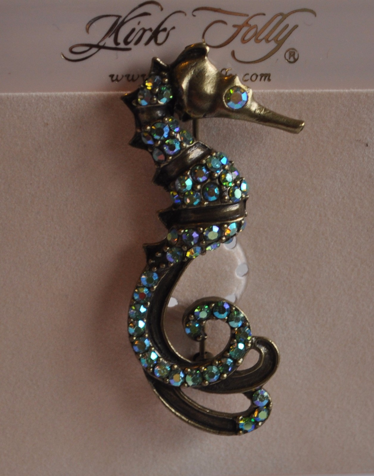 KIRKS FOLLY SEA HORSE PIN  IN  ANTIQUE GOLD  TONE