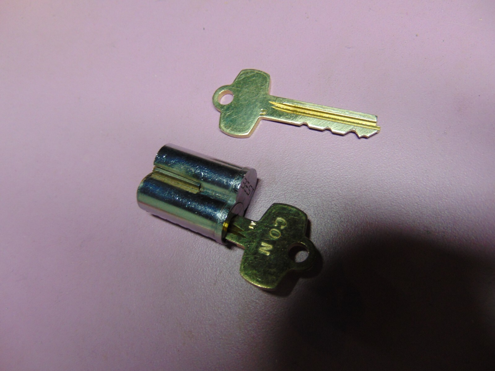 1 - BEST LOOK ALIKE  M BLANK CORES  PIN  7 PIN  1 KEYS AND 1 CORE    LOCKSMITH