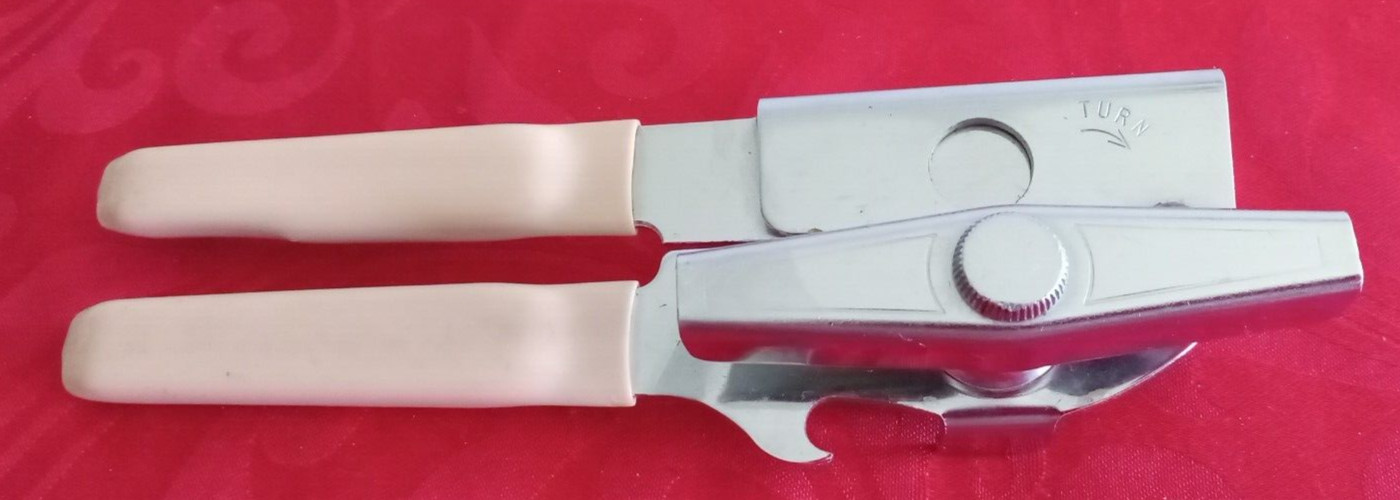 Vintage Swing-A-Way manual can opener with beige plastic handles EUC