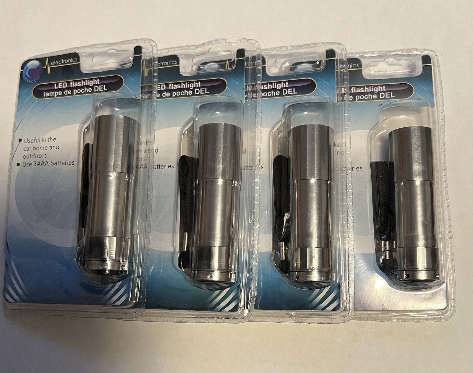 Circuit Electronics LED Flashlight Silver Set Of 4 Batteries Not Included.