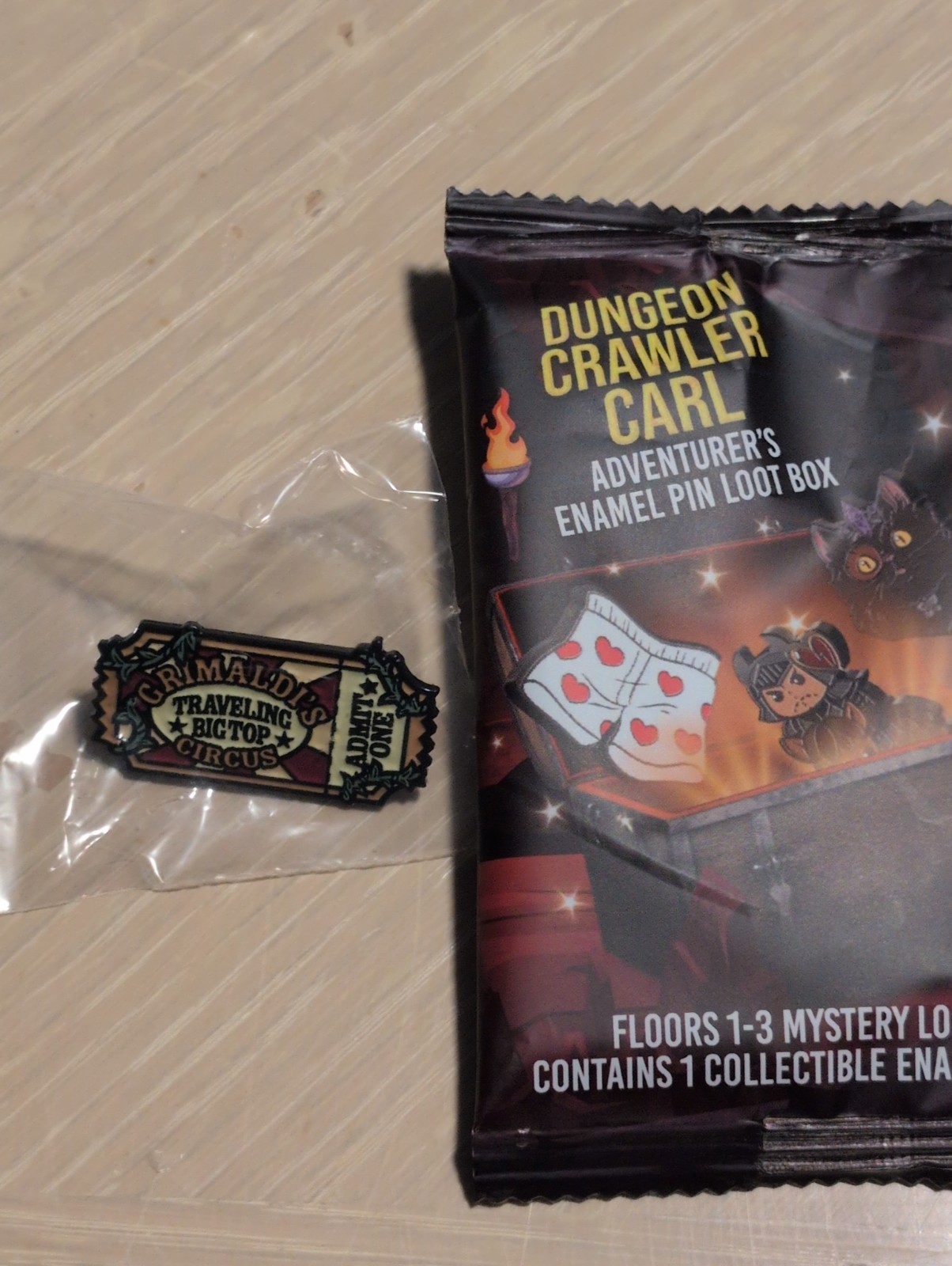 New Foam Brain Games Dungeon Crawler Carl Grimaldi's Ticket Loot Box Enamel Pin