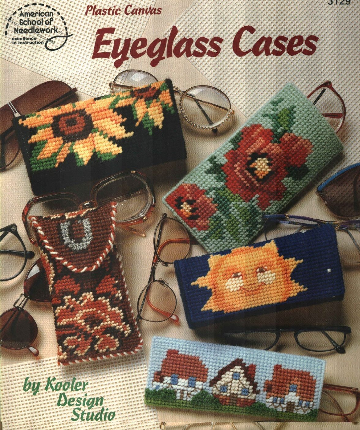 USED EYEGLASS CASES FLOWERS BEAR BUNNY 12 DESIGNS PLASTIC CANVAS PATTERN BOOK