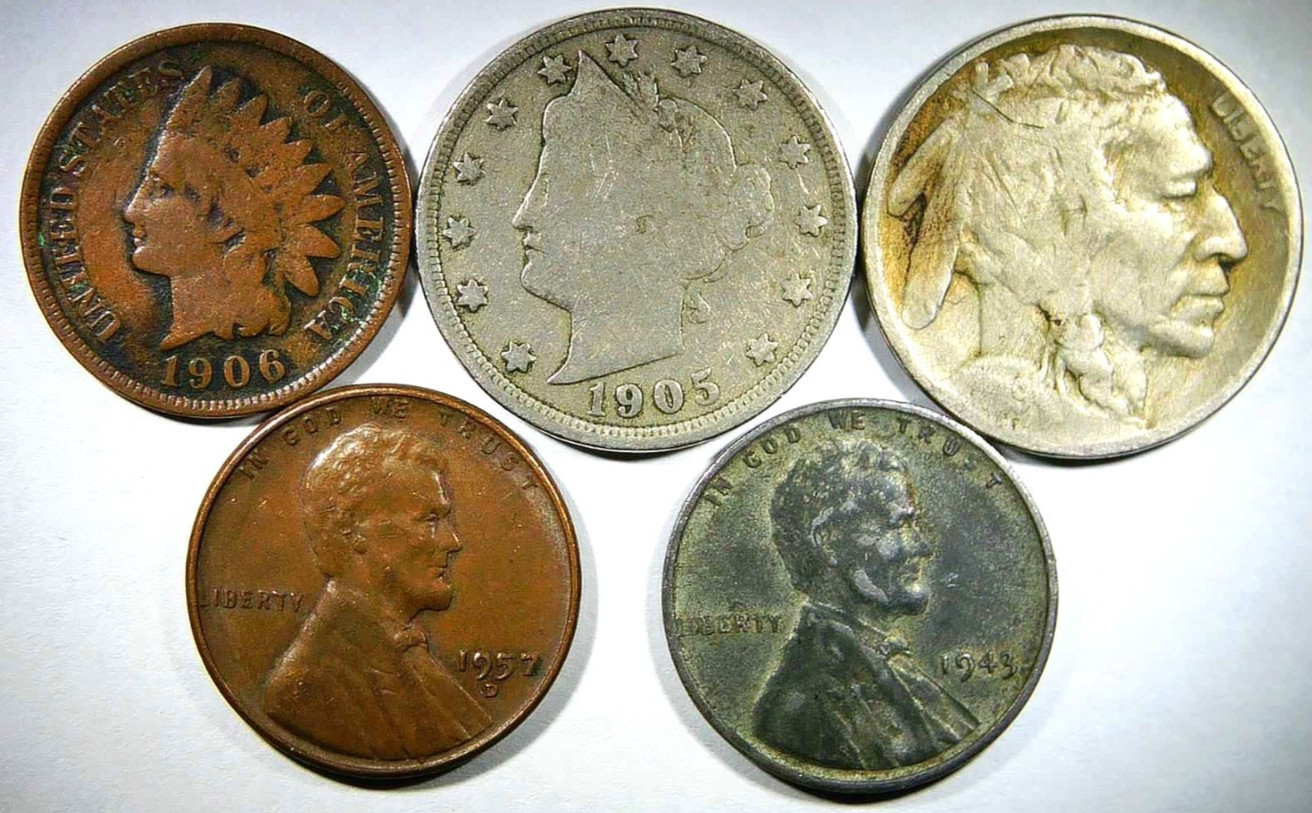 Us coin lot with a wheat cent, an Indian head cent, a buffalo nickel, and more.