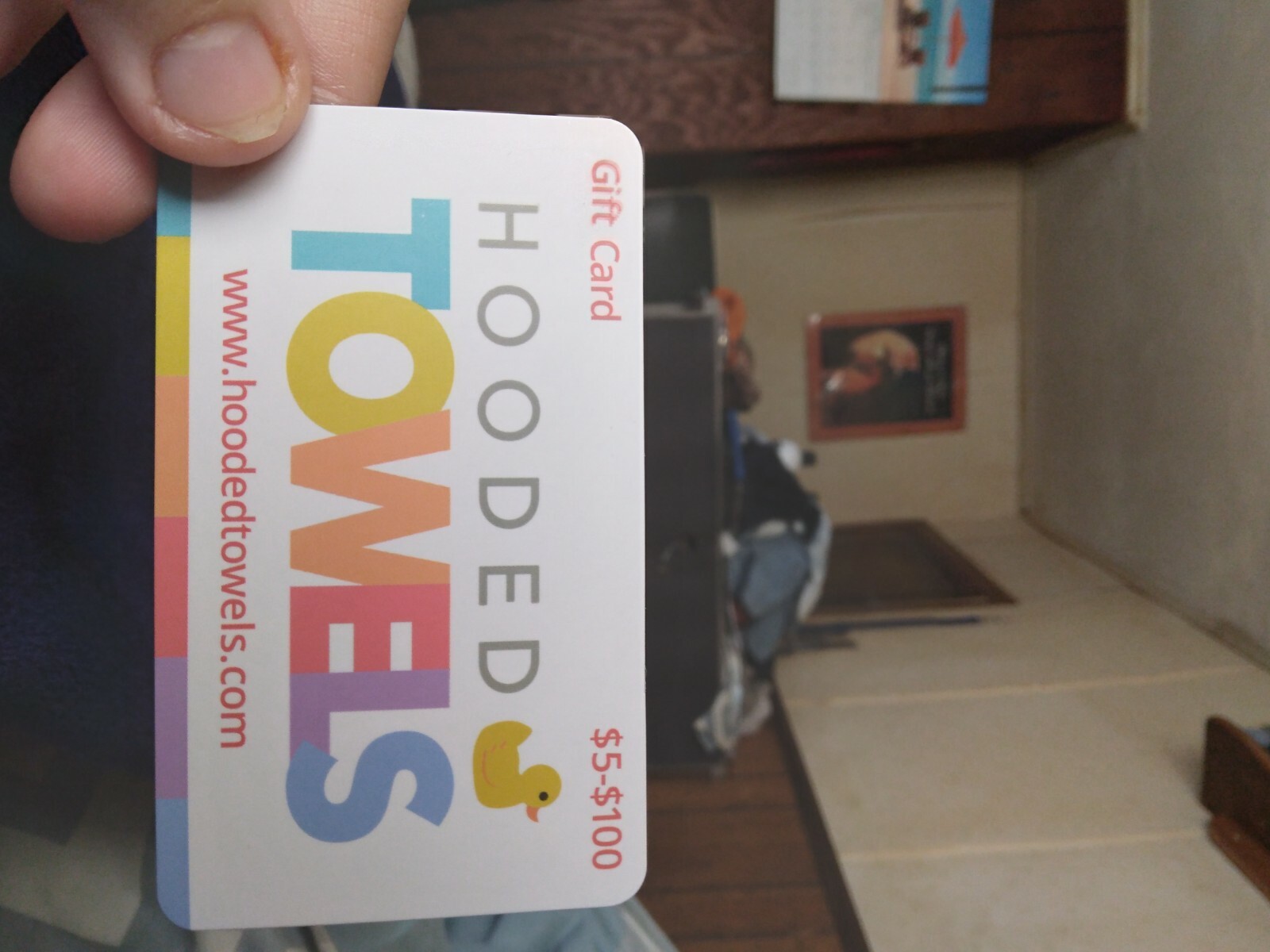 HoodedTowels gift card. Baby hooded bath towel to dry baby