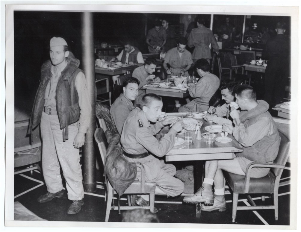 1943 Guard by Italian Officer POWs in Ships Cafeteria 7x9 Original News Photo