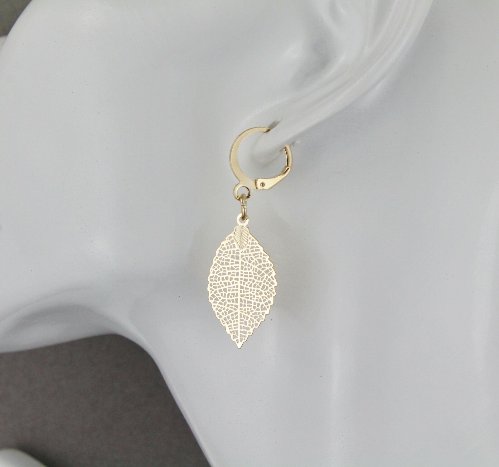 gold leaf earrings small filigree leaves dangle 1.75" long leverback lightweight