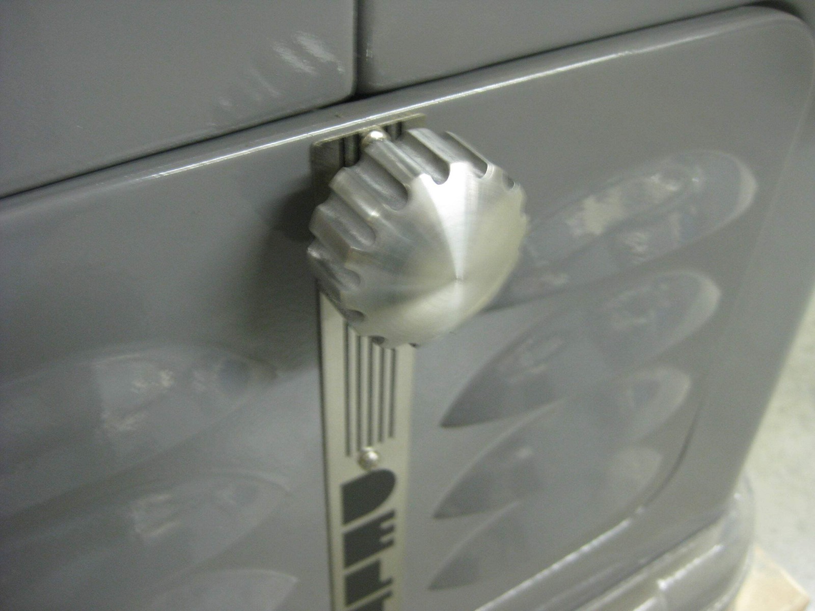 DUST DOOR LATCH CAM FOR A DELTA UNISAW OR THE DELTA HEAVY DUTY SHAPER