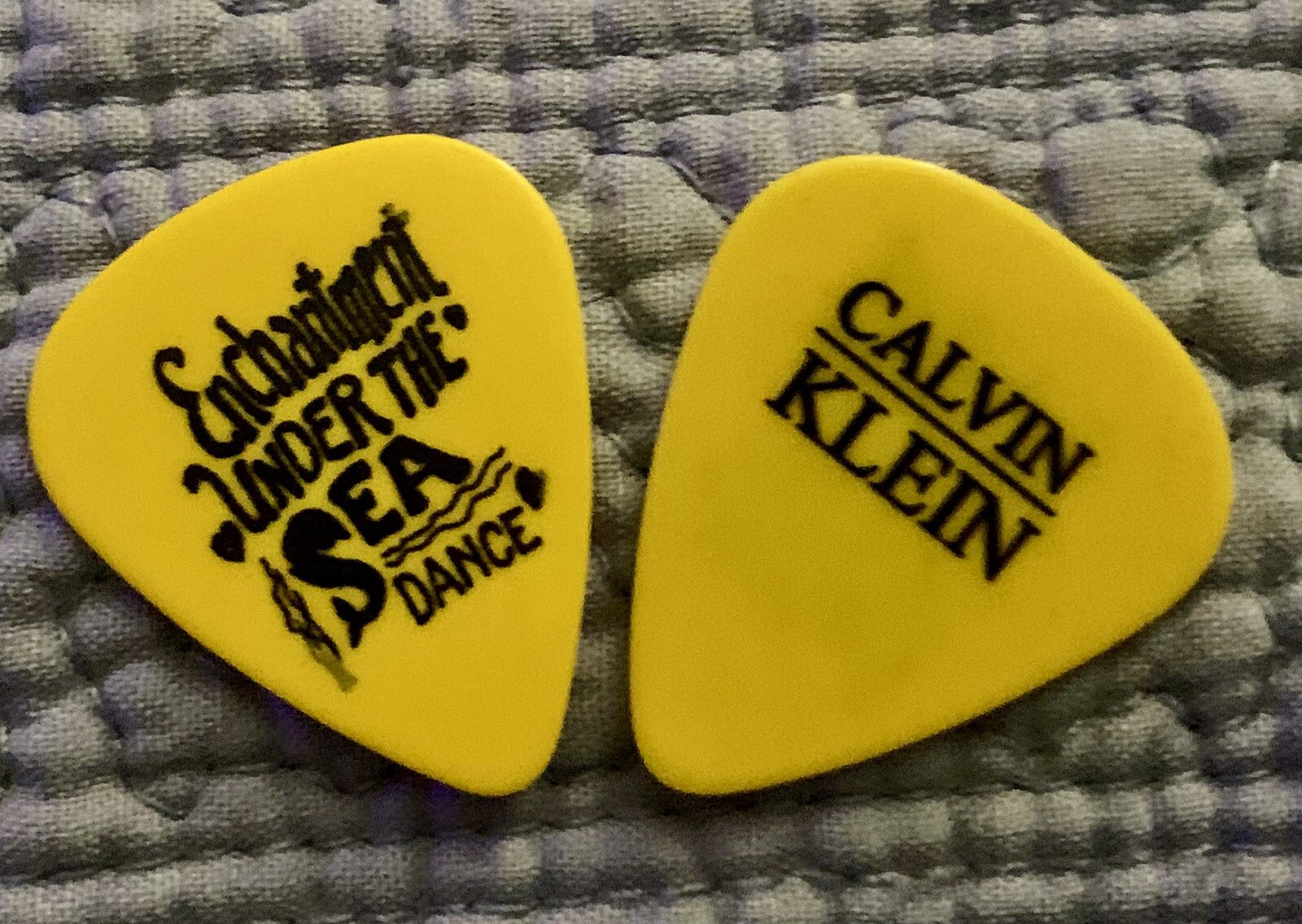 ENCHANTMENT UNDER SEA Calvin Klein MARTY MCFLY Guitar Pick BACK TO THE FUTURE