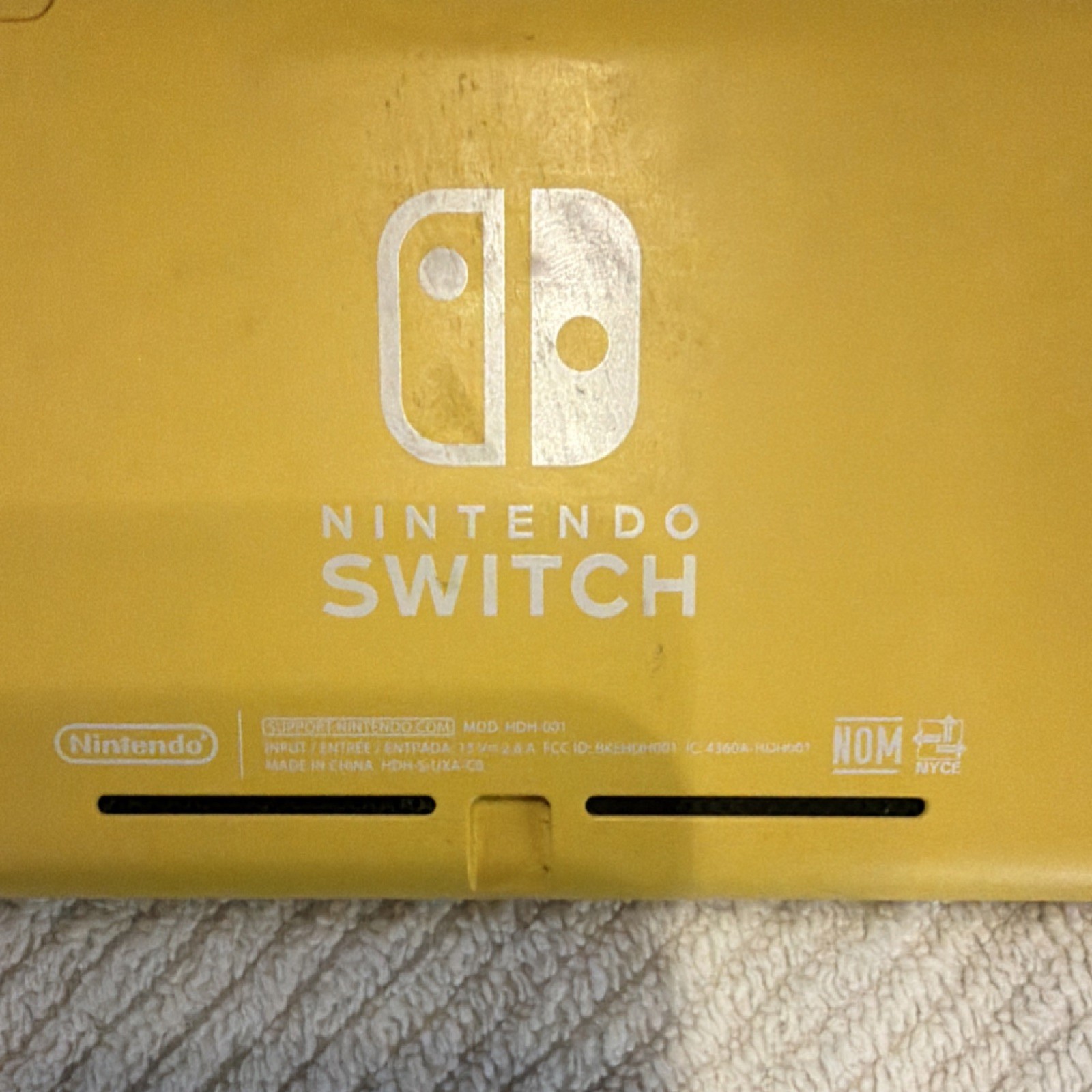 Nintendo Switch Lite Yellow Console Bundle w/ Super Smash Bros Ultimate & Mario…