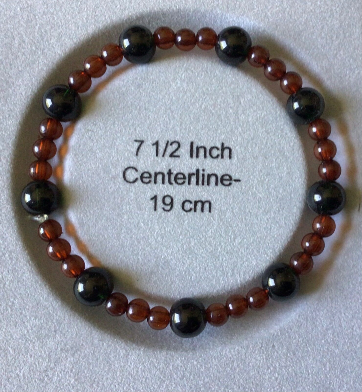 7.5" bracelet w/two tone brown beads, made in the USA