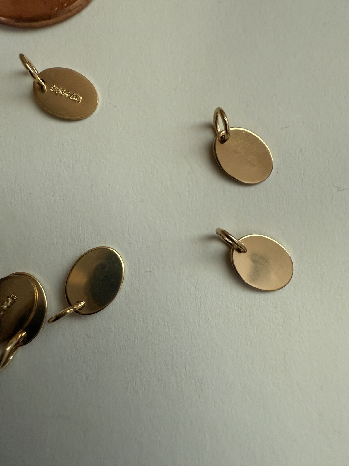 14kt gold filled 26 gauge oval tags 10pcs, 7.3x5.5mm with closed ring.