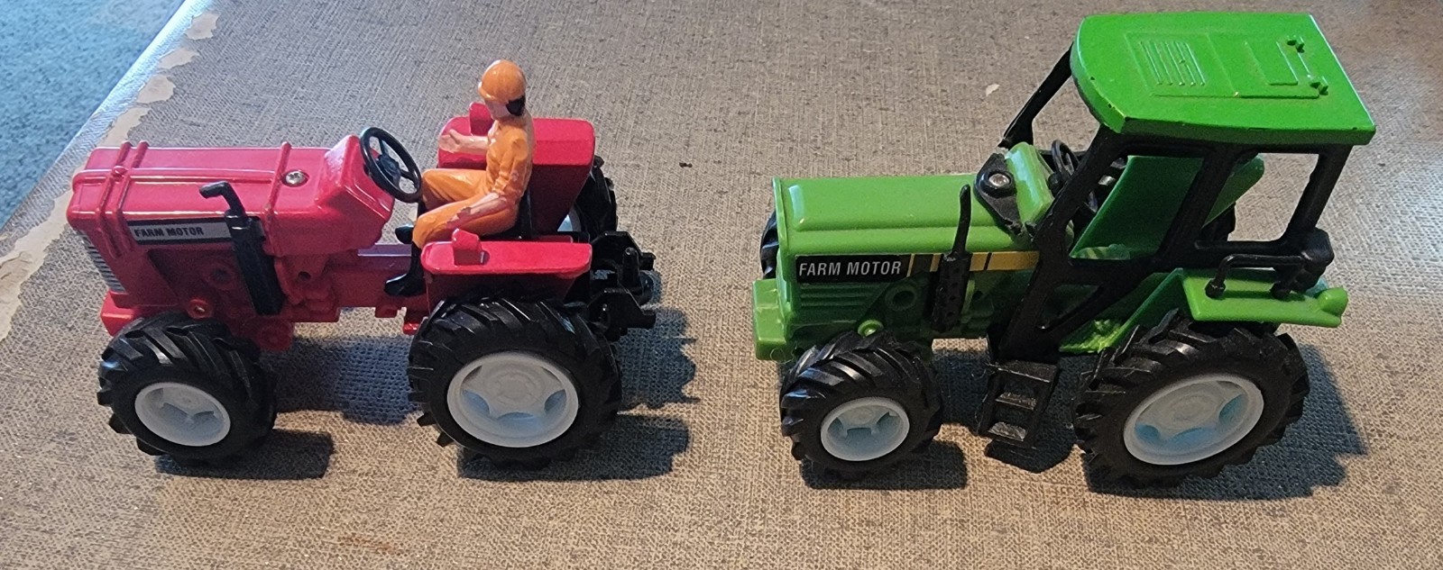 TWO FARM MOTOR TRACTORS BX118