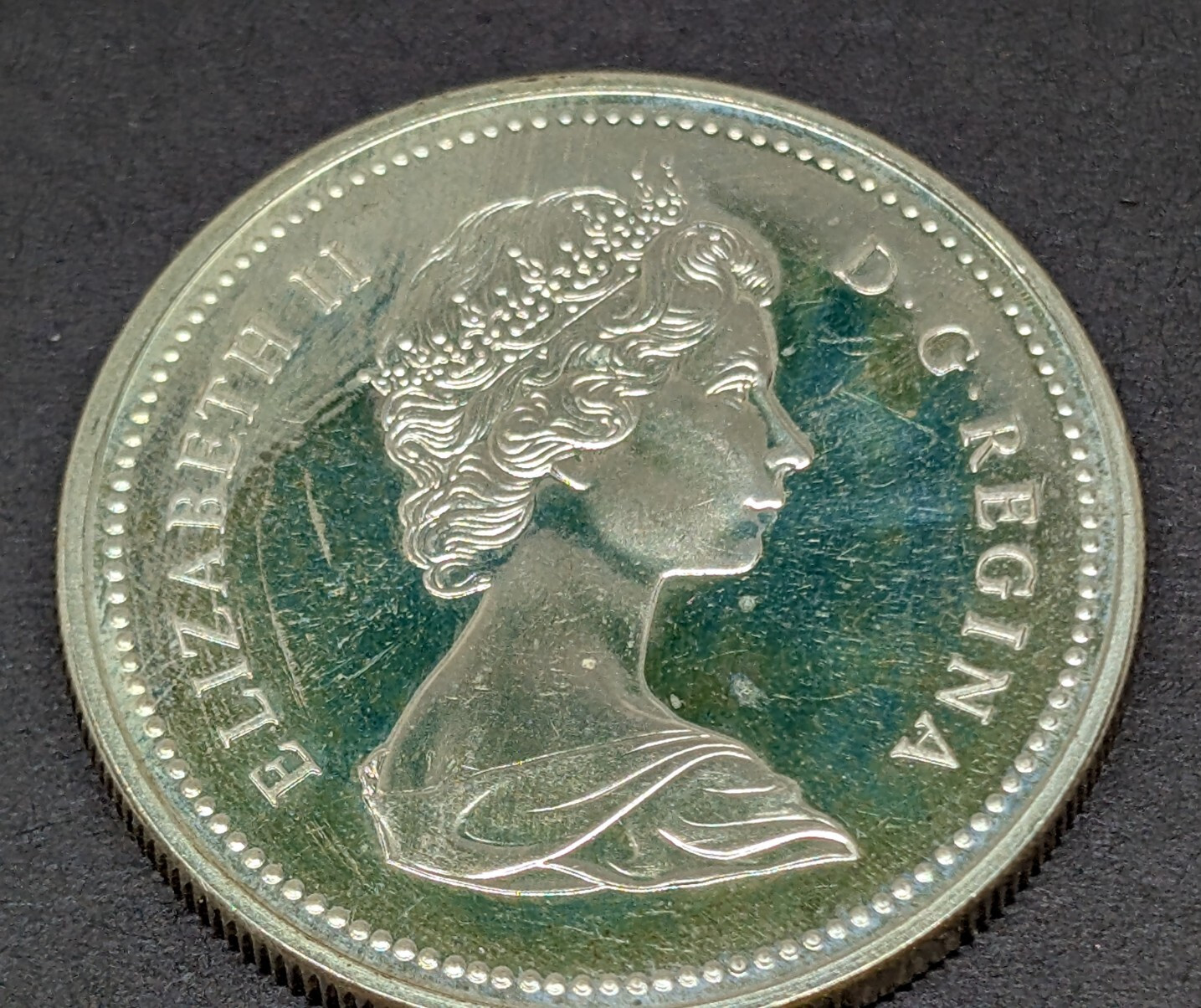 1973 Canada Silver Dollar $1 Toned Reverse 250430