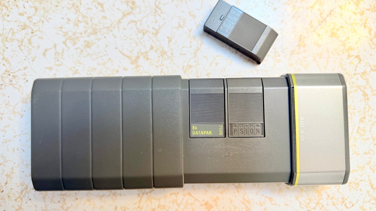 Psion Organiser II with powered comms link cable/charger 8K data pack