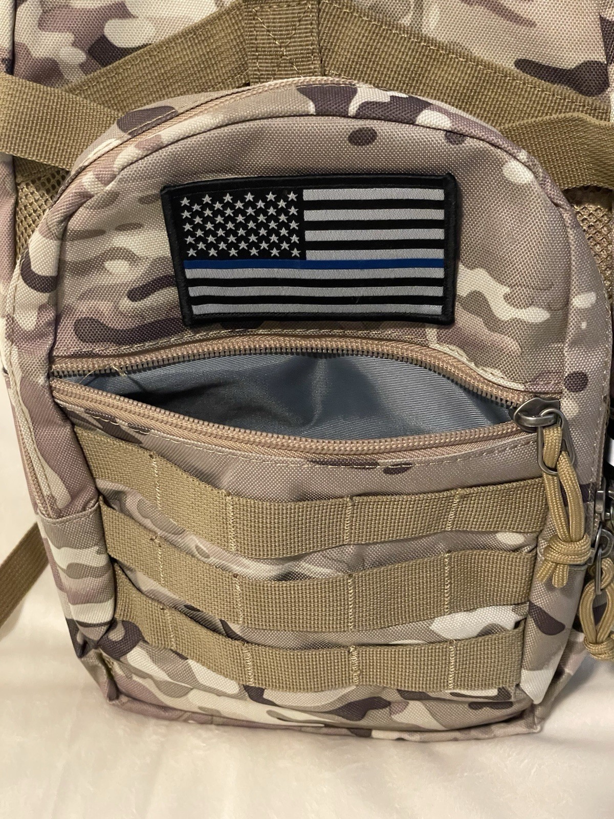Tactical MOLLE Hydration Backpack with a camouflage pattern.No bladder.(sku#M1)