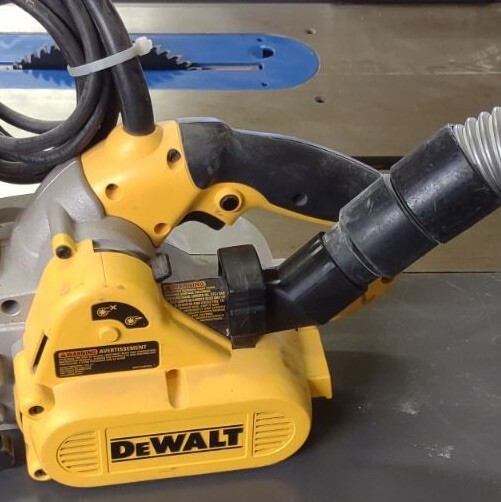 Adapter for DeWalt DW433 belt sander dust port to a common Shop-Vac 1-1/4" hose.