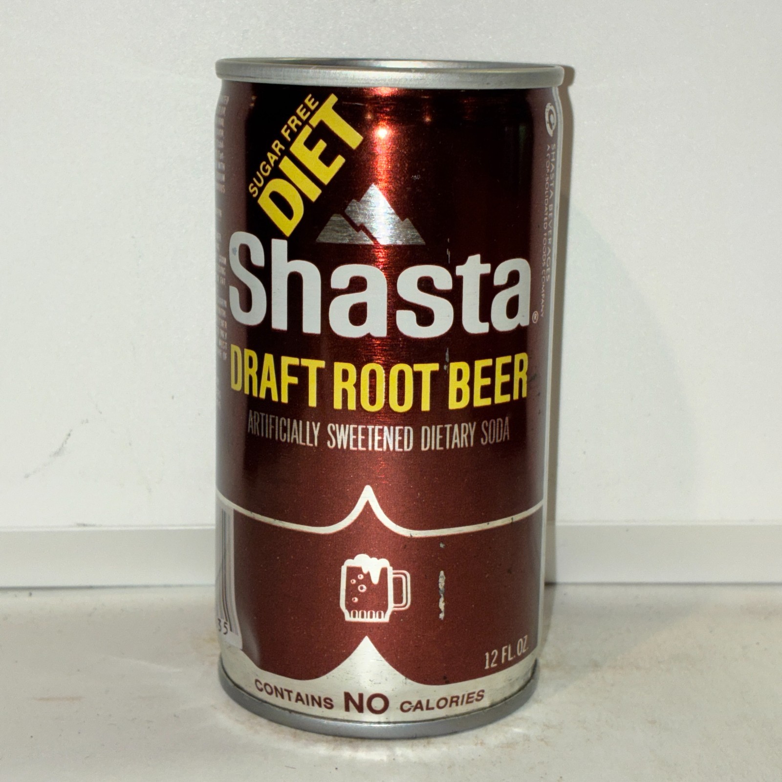 Shasta Diet Draft Root Beer Soda can, crimped steel, bottom opened